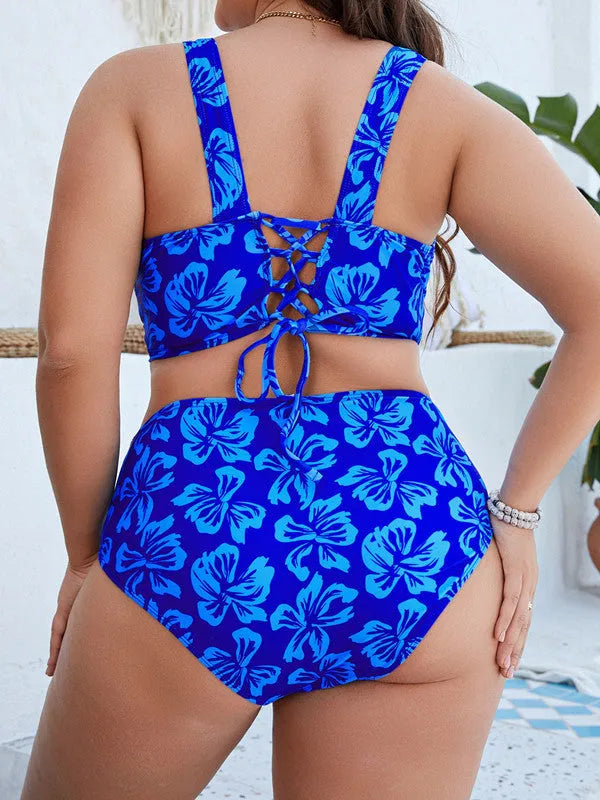 Blue floral print women's split bikini swimsuit on a hanger, plus size range.