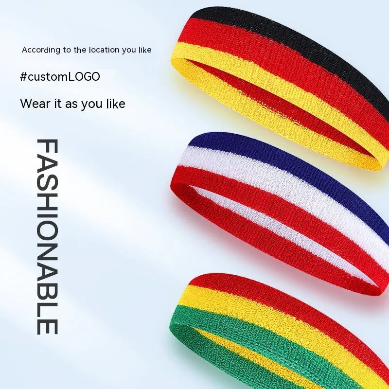 Adult sports headband in multiple colours including blue and red yellow, shown flat displaying 5.5cm width.