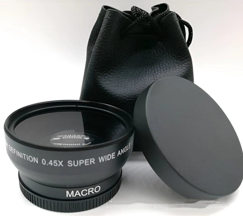 Black 52mm wide-angle macro camera lens with front and back covers on a table