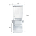 Countertop cereal dispenser in white with clear container and black lever showing chute opening