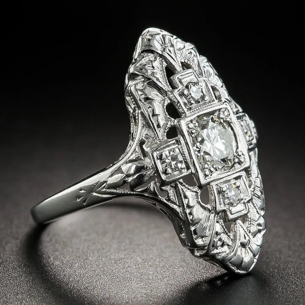 Geometric hollow-out copper ring with electroplated silver finish and diamond studs