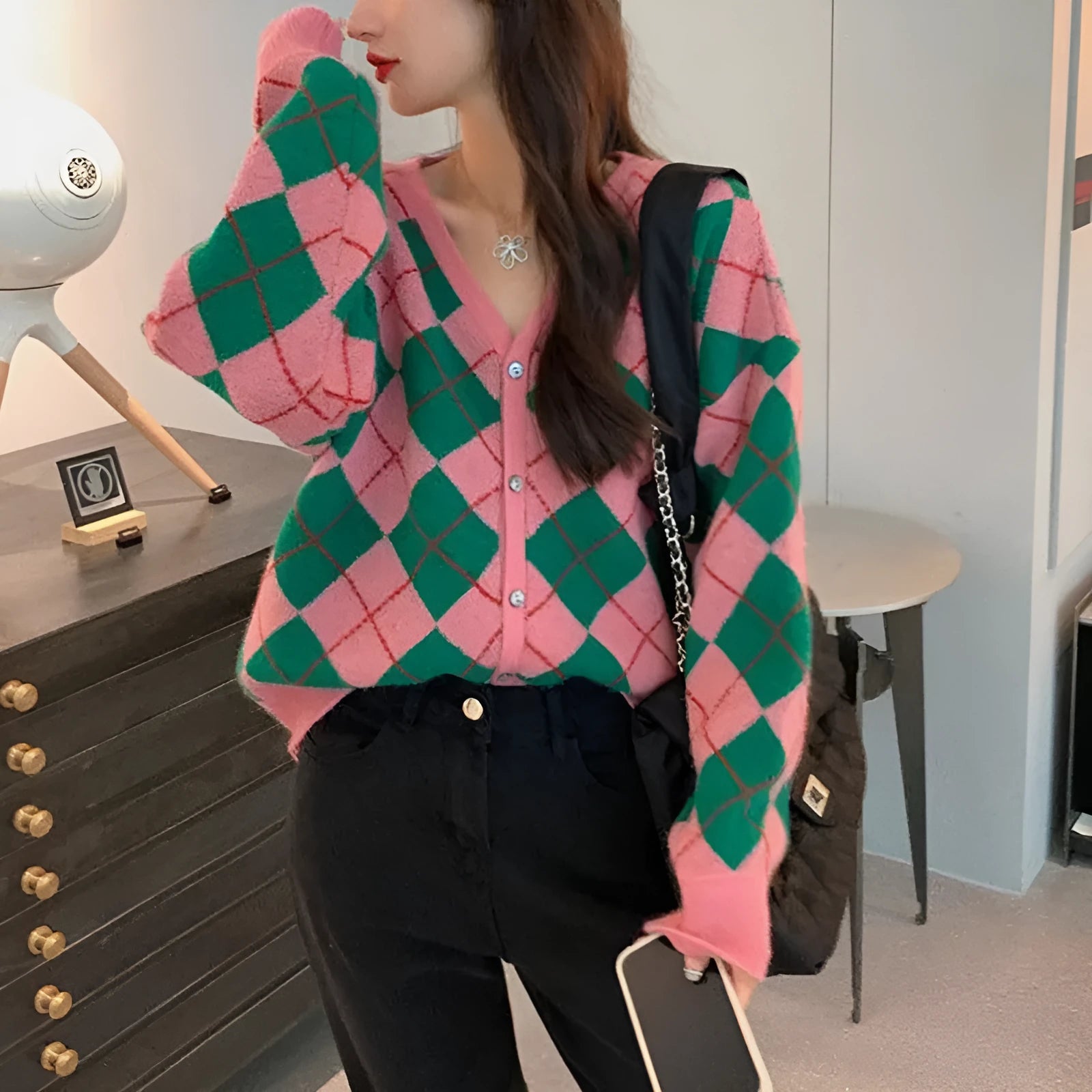 Casual knitted cardigan coat in a selection of colours including pink, green, and khaki, shown on a model.