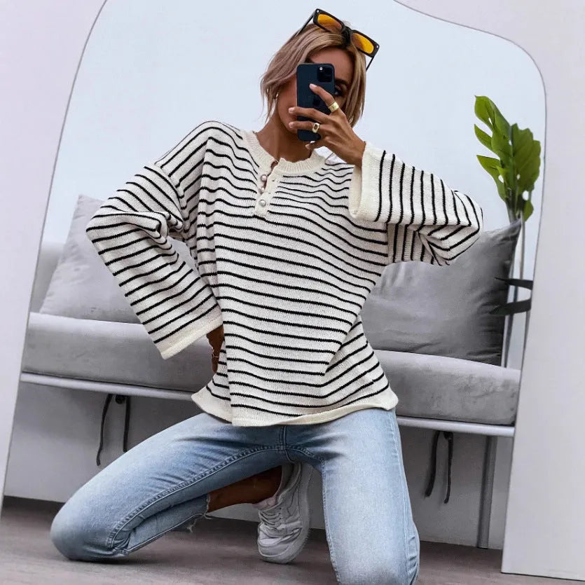 Black women's striped top with drop-shoulder sleeves and loose casual fit