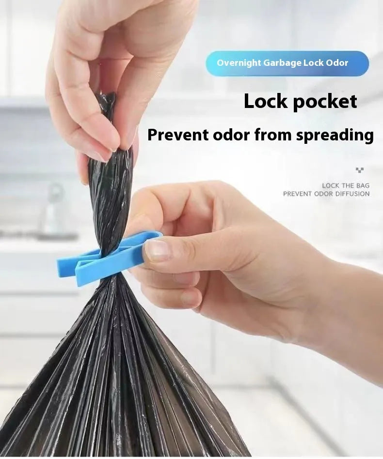 A white polypropylene plastic clip for holding bin bags onto the side of a rubbish bin.