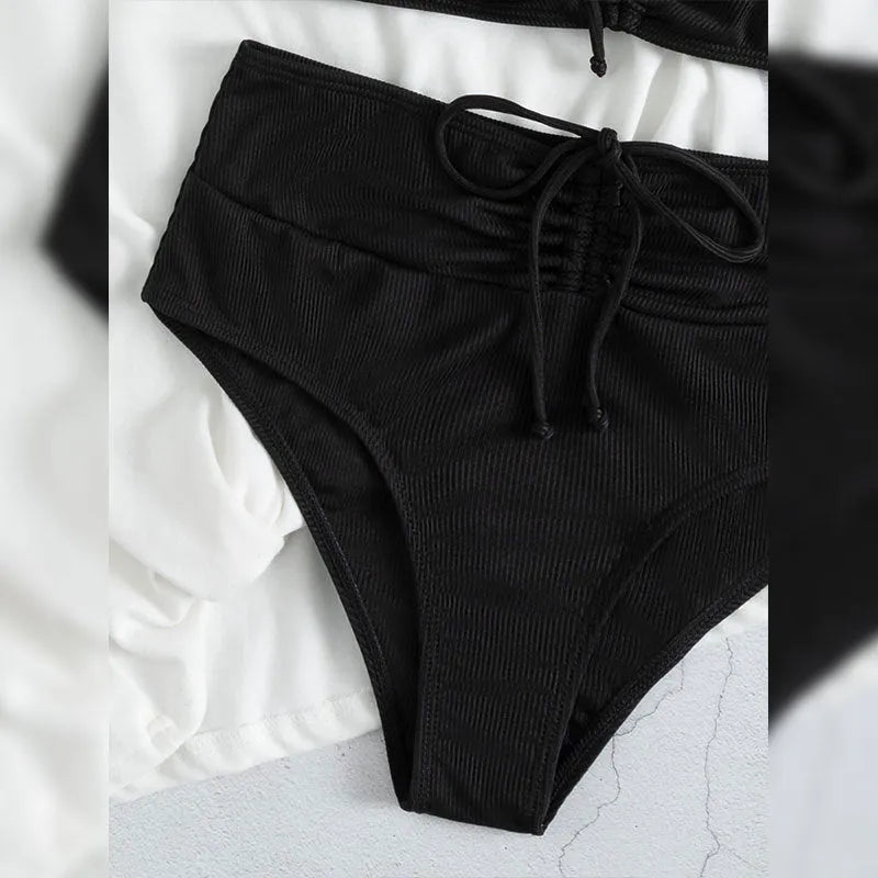 Black women's high waist bikini swimsuit with sling-split design and sleeveless top