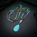 Turquoise water drop pendant necklace with mixed gem inlaid design and ball bead chain