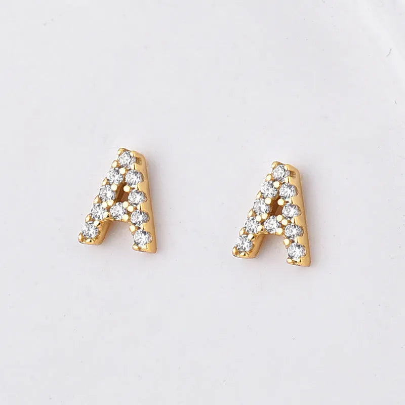 Brass gold plated alphabet letter earrings showing English characters from A to Z options