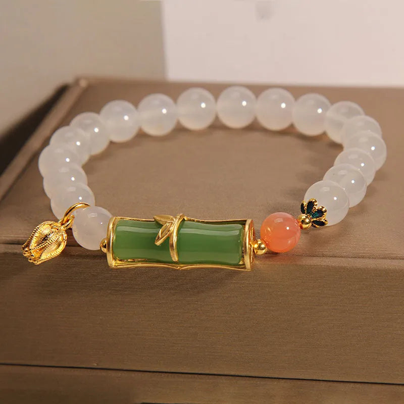 White agate jasper bracelet with a natural jade bead and bamboo joint design