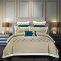 Four-piece cotton embroidery bed linen set in a choice of five colours and patterns.