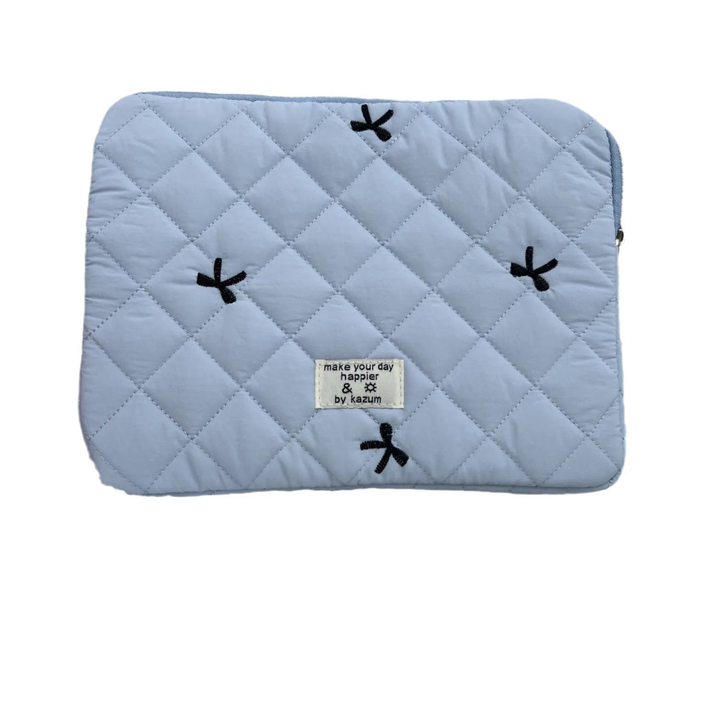Cute rhombus embroidered bow laptop sleeve in light blue colour, zipper closure.