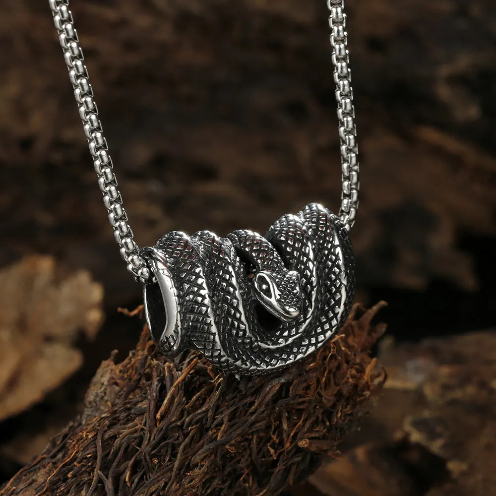Geometric stainless steel Python pendant necklace in single pendant steel colour on a plain background
