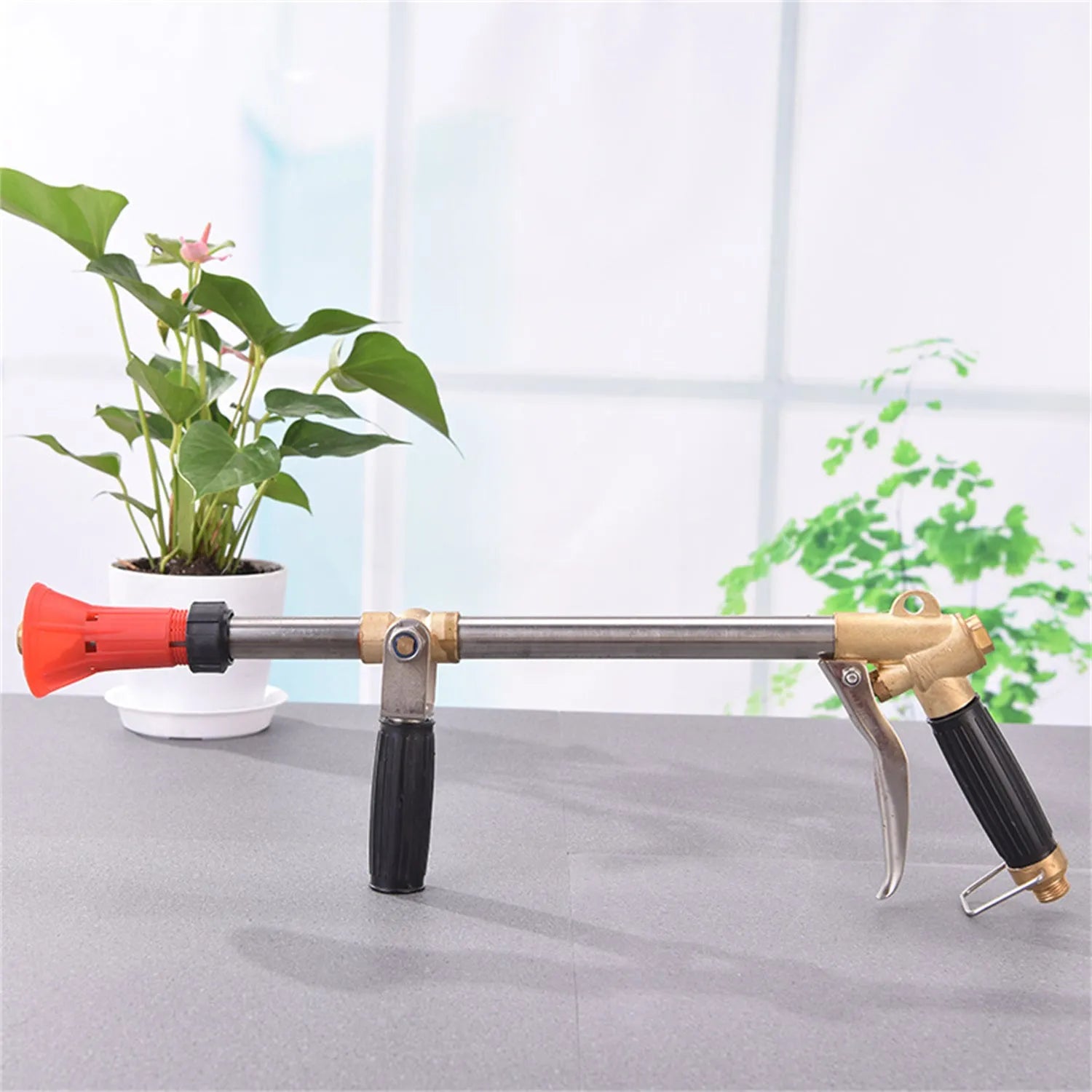 Adjustable agricultural spray gun with submachine gun style handle for pesticide spraying