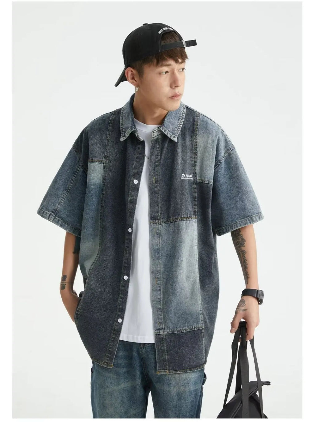 Blue men's loose-fit denim shirt with Japanese retro wash and stitching details, shown open as a cardigan.