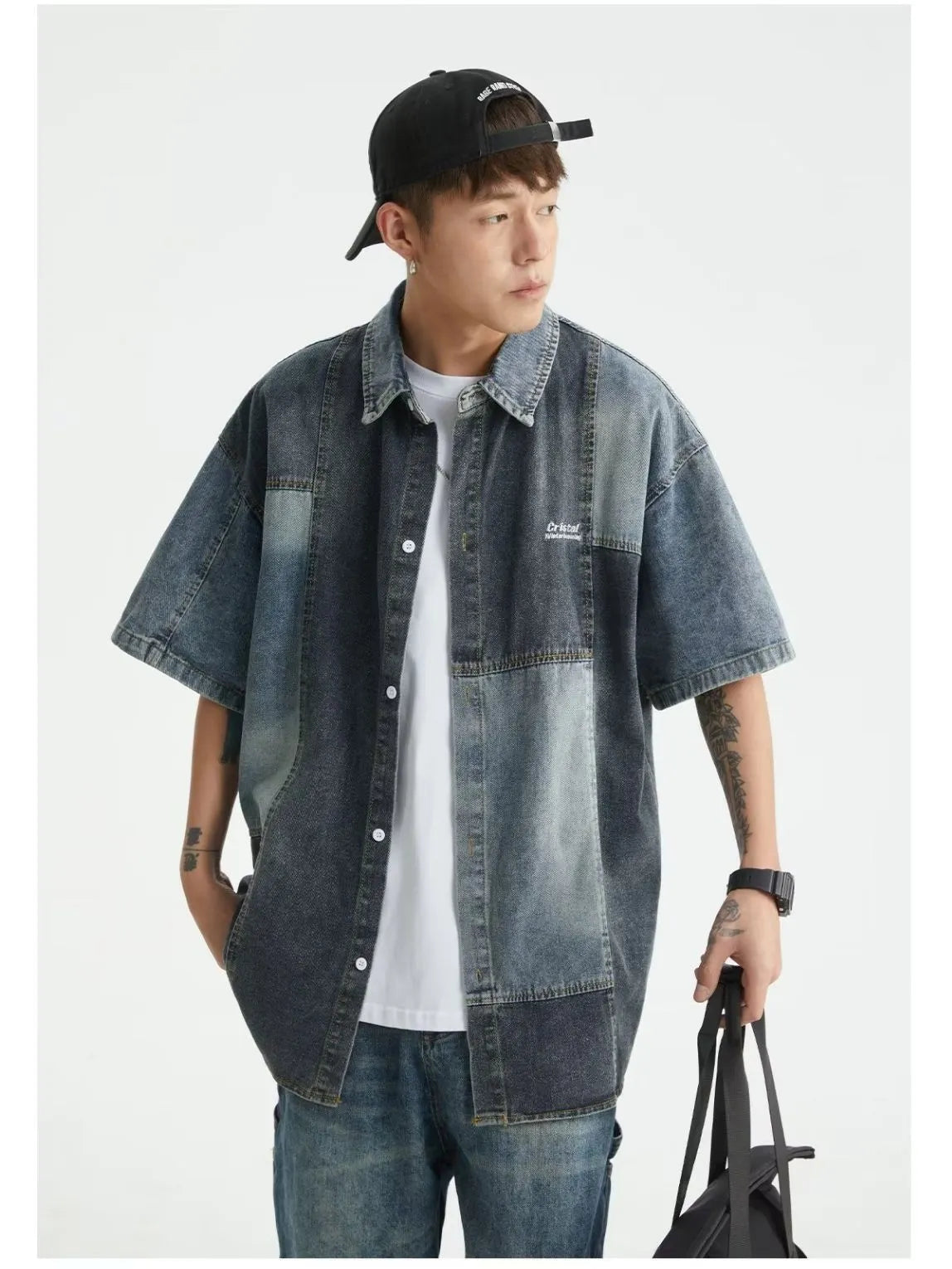 Blue men's loose-fit denim shirt with Japanese retro wash and stitching details, shown open as a cardigan.