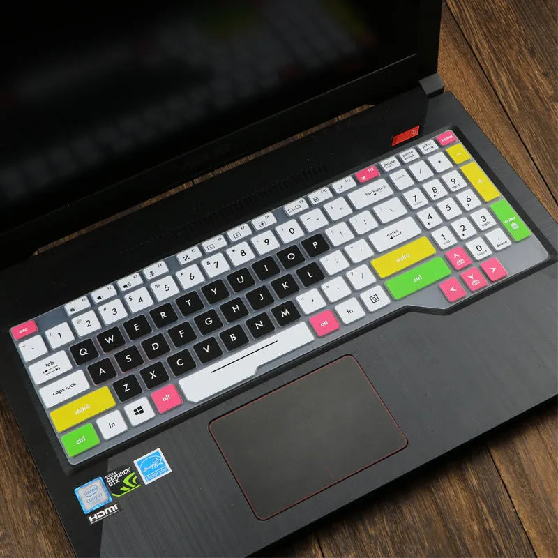 ASUS VivoBook 15 X513 laptop with a translucent mint coloured silicone keyboard protector fitted.