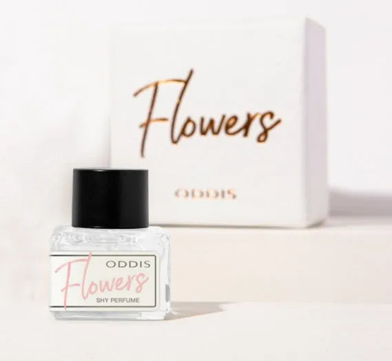 5ml Secret Garden Shame Perfume oil rollerball in a small glass bottle on a surface, compact travel size.