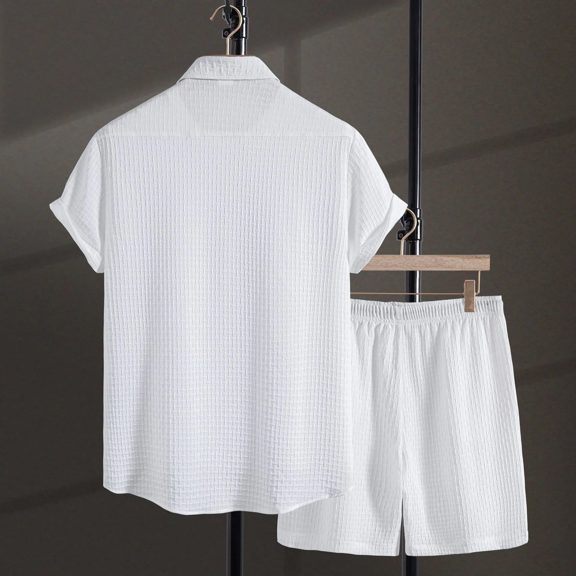 Men's black casual summer shirt and shorts suit with short sleeves on hanger