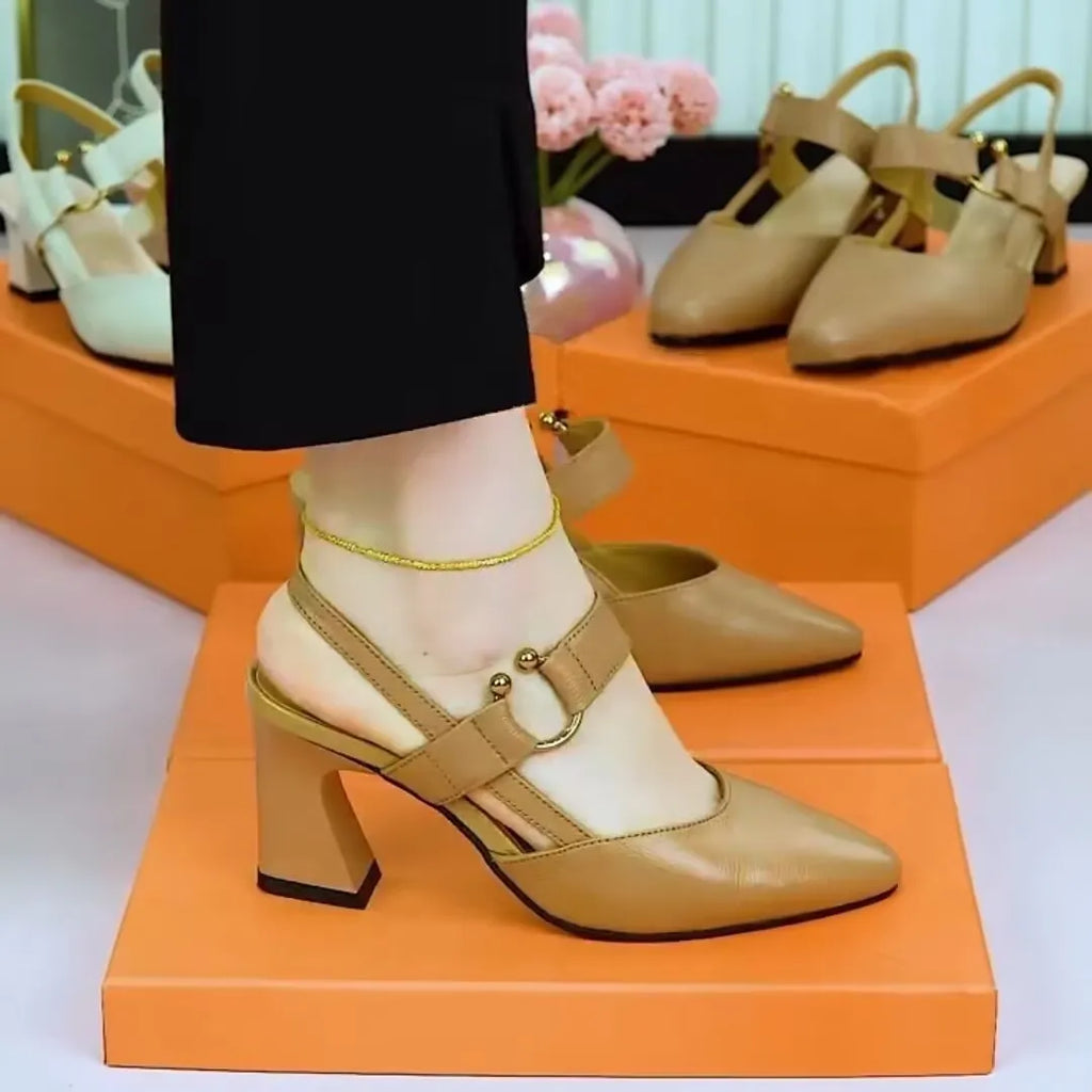 Women's apricot coloured leather sandals with a closed toe, chunky heel, and rubber sole