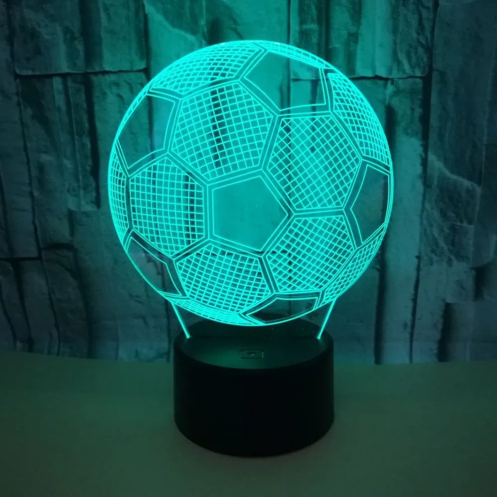 3D football shaped night light with colour changing LED display and remote control on acrylic base
