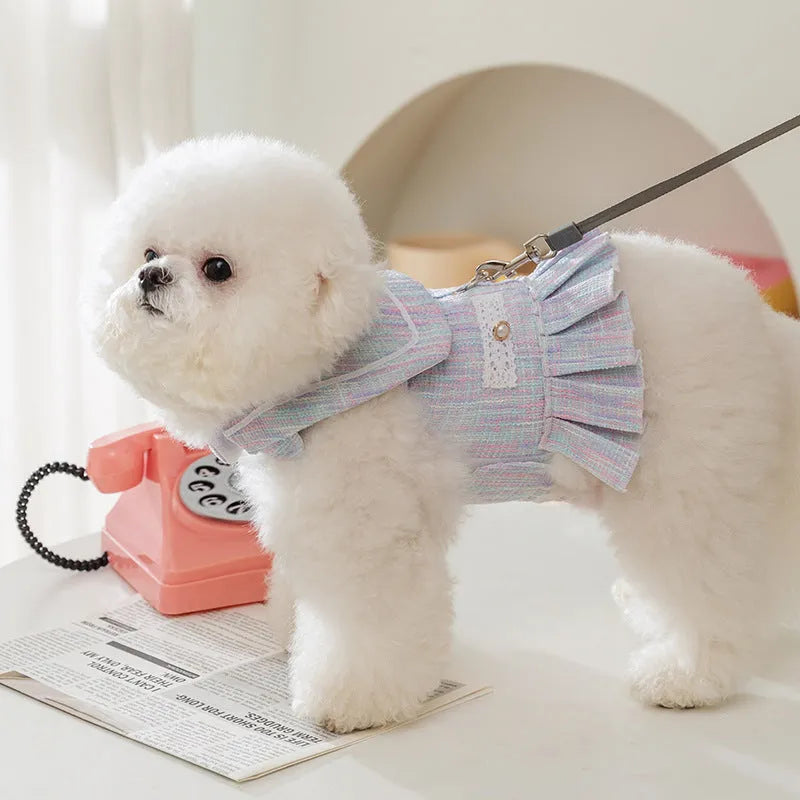 Polyester pet clothes for cats and small dogs in purple and pink colours showing four size options