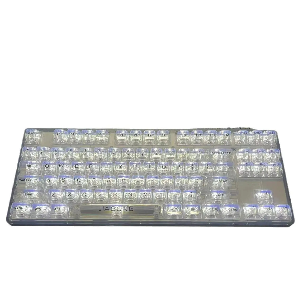 Universal transparent plastic 132-key mechanical keyboard key cap set laid out.