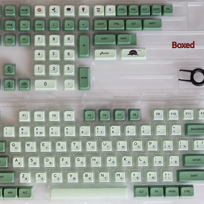 Full set of 124 matcha green PBT keycaps for a mechanical keyboard, showing various international layout options.