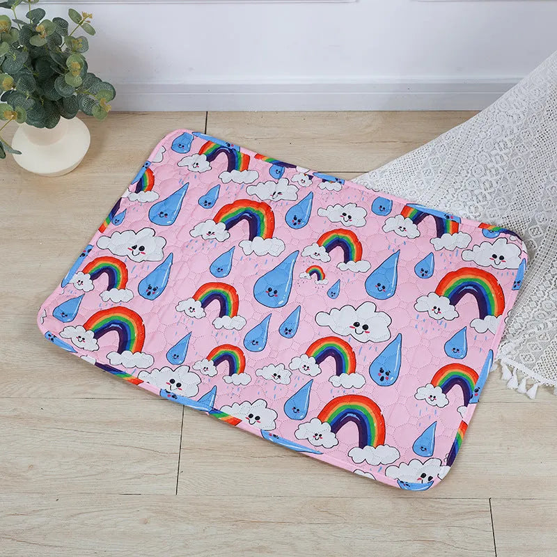 Reusable washable pet urine pad with colourful animal print design and waterproof backing.