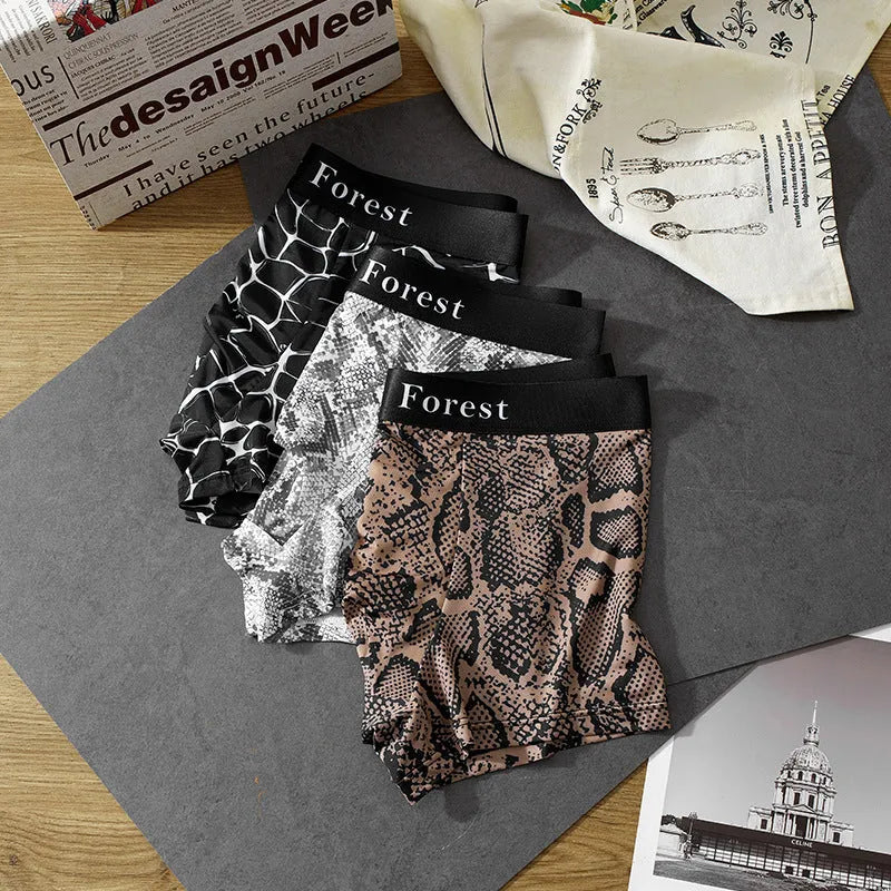 Men's black loose fit thin polyester boxer shorts on a mid waist