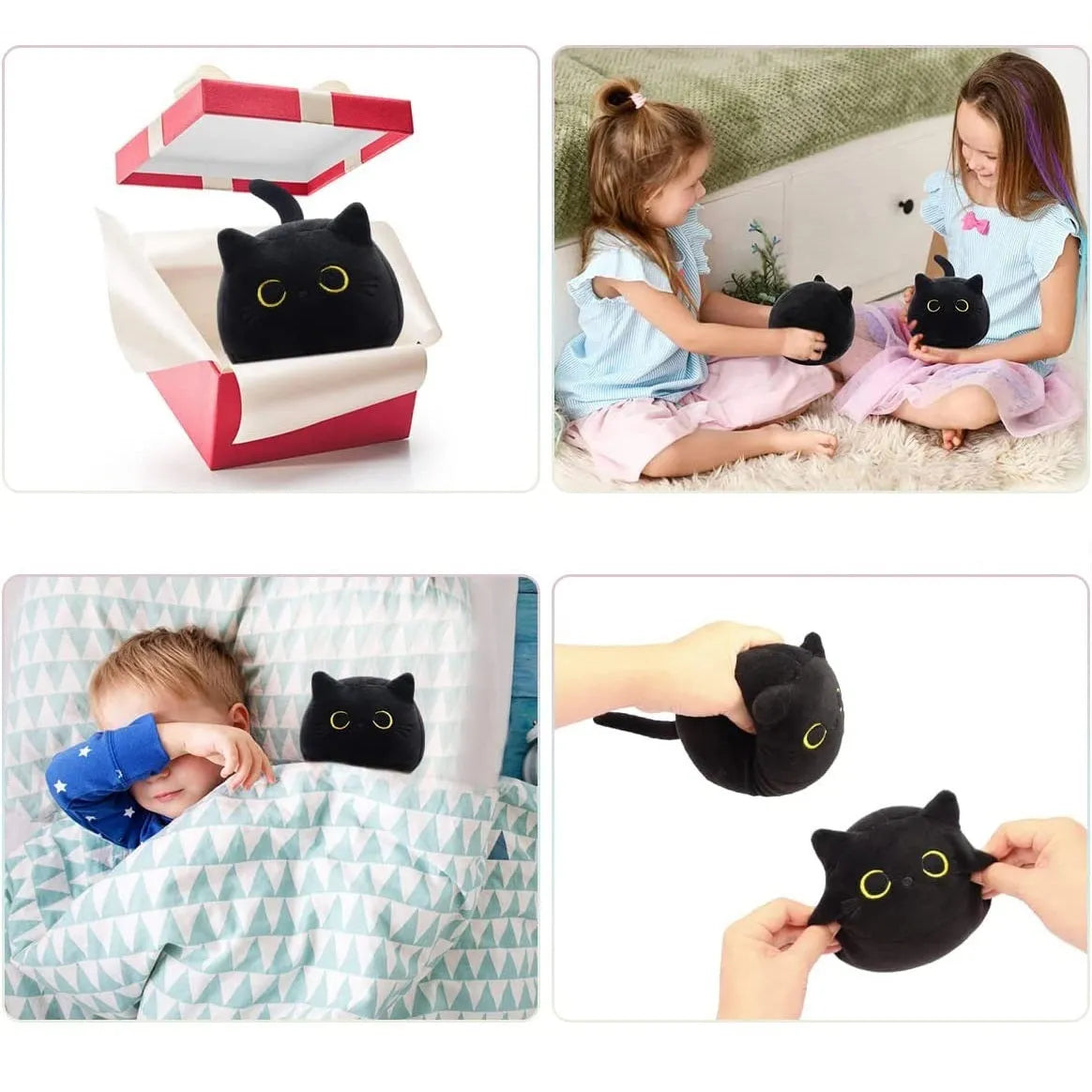 Fluffy black cat plush toy with embroidered face on a soft cushion
