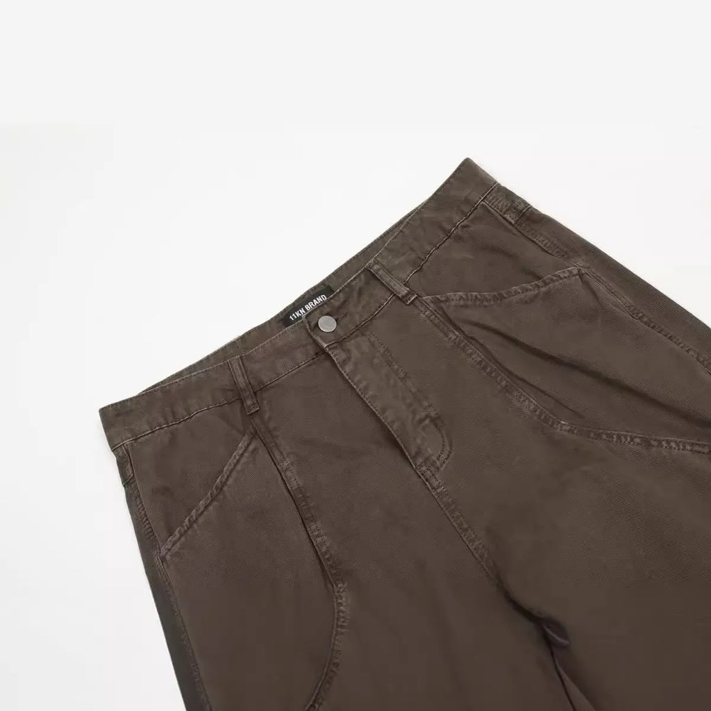 Men's brown straight-leg cotton trousers with loose fit and high-waist design