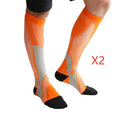 Black graduated compression socks for men and women, shown laid flat.