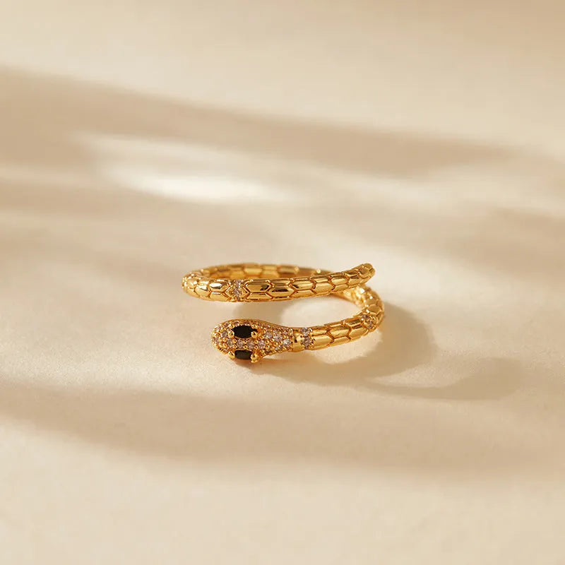 Adjustable snake finger ring with gold plating on copper and diamond treatment surface