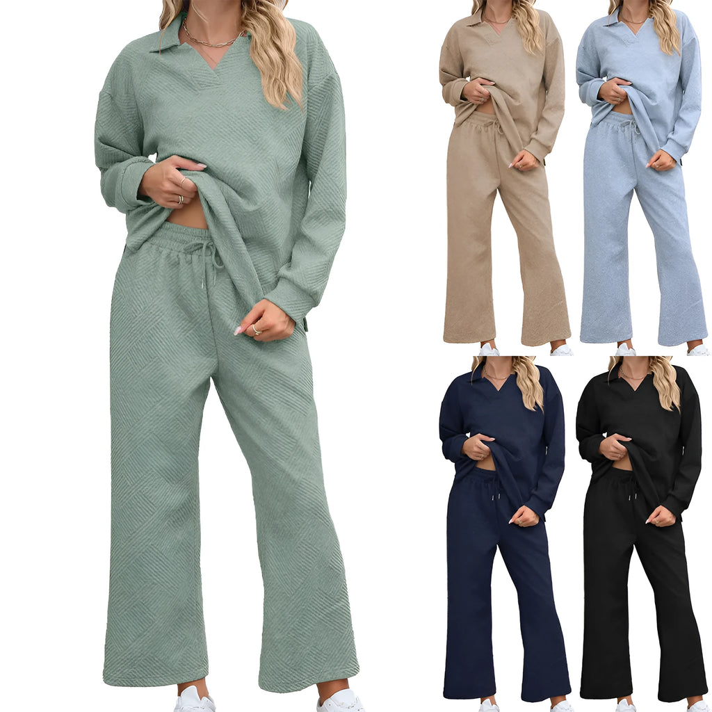Women's solid colour knitted suit set with lapel top and cropped trousers in gray.