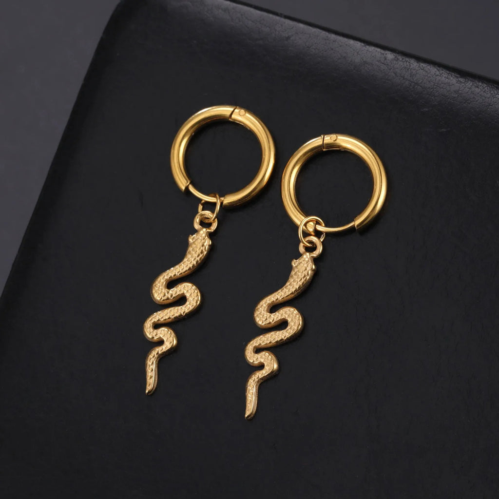 Vintage snake-shaped stainless steel earrings with gold plating in an ear clip design.