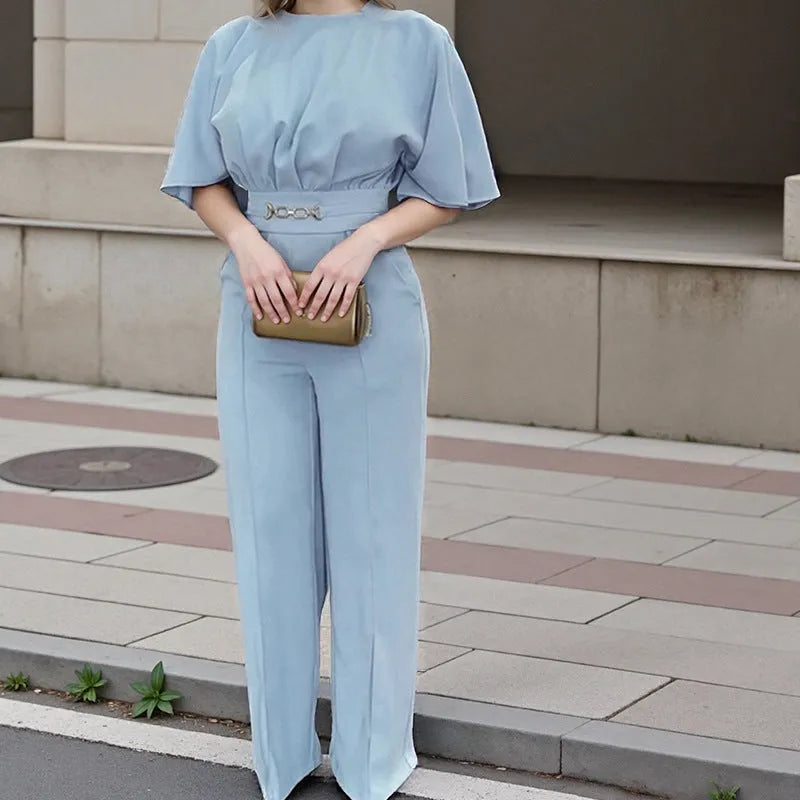 Blue men's two-piece casual suit with long sleeves and trousers on a model