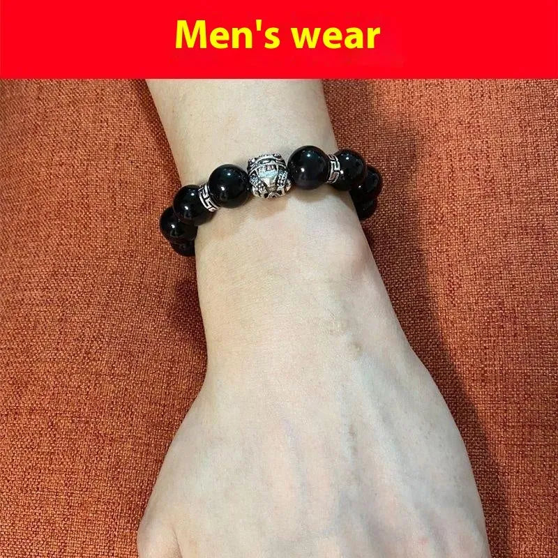 Obsidian and 999 silver bracelet with natural cloud pattern beads, shown in 10mm and 12mm sizes.