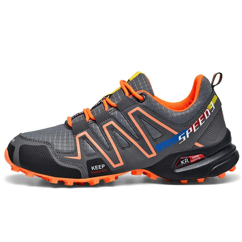 Men's grey orange and black white wide fit casual running shoes with low top design.