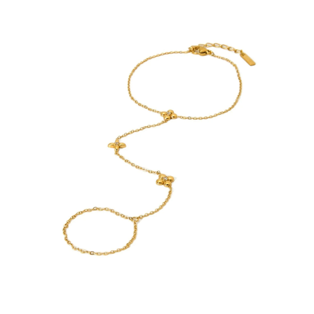 Gold stainless steel women's bracelet with eight-pointed stars and floral geometric design