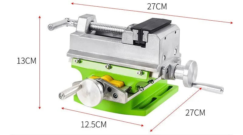 Mini bench drill and milling machine with included 1050W drill and metal bench pliers on a workbench.