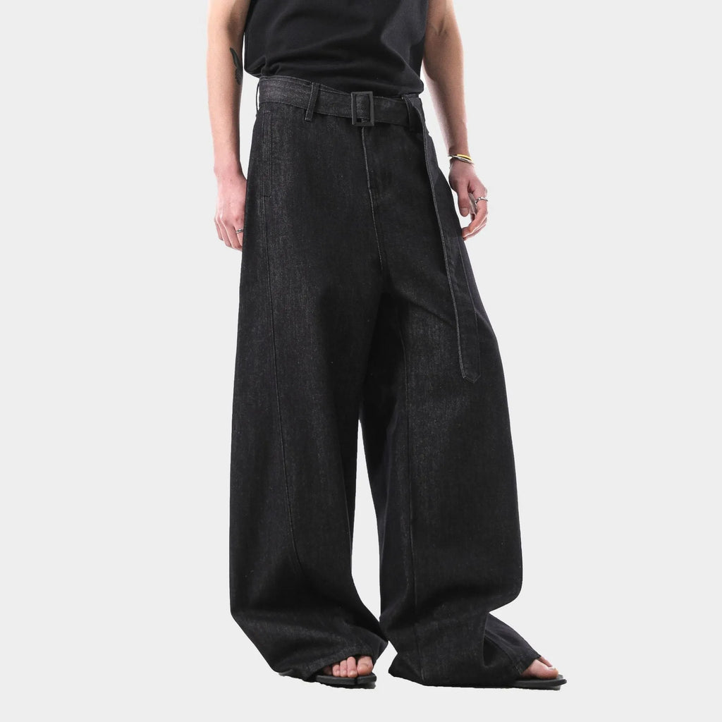 Black high waist straight-leg jeans with gold stitching on a mannequin