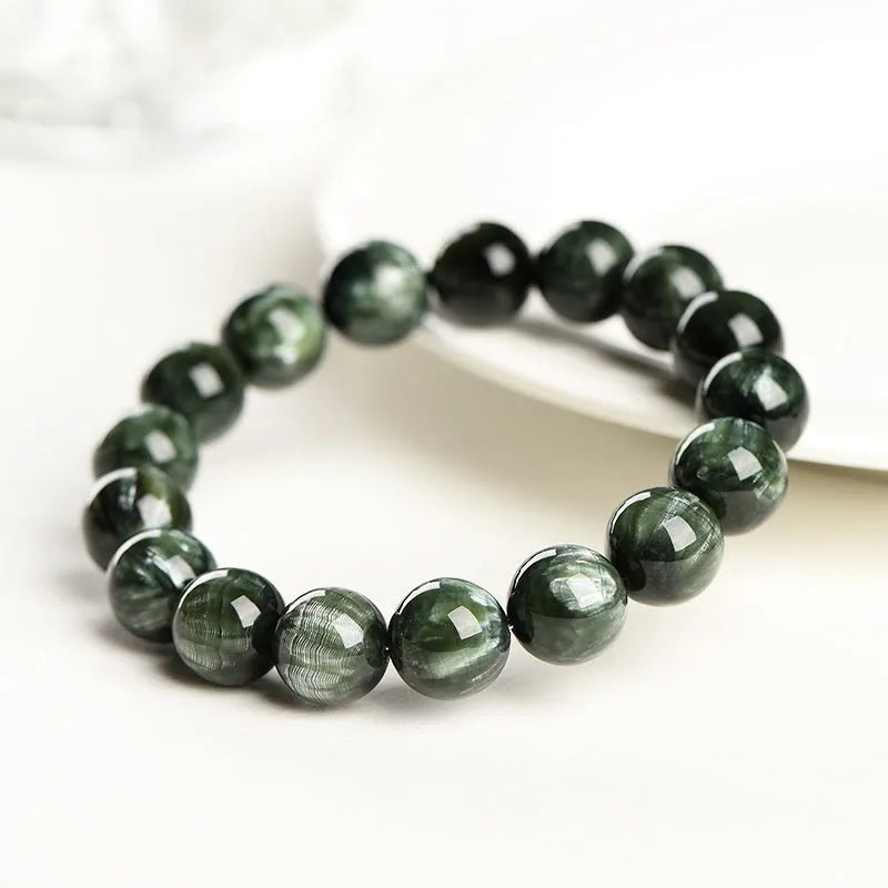 Green Dragon Crystal bracelet with 8-9mm round beads and Ruyi design on a single ring.