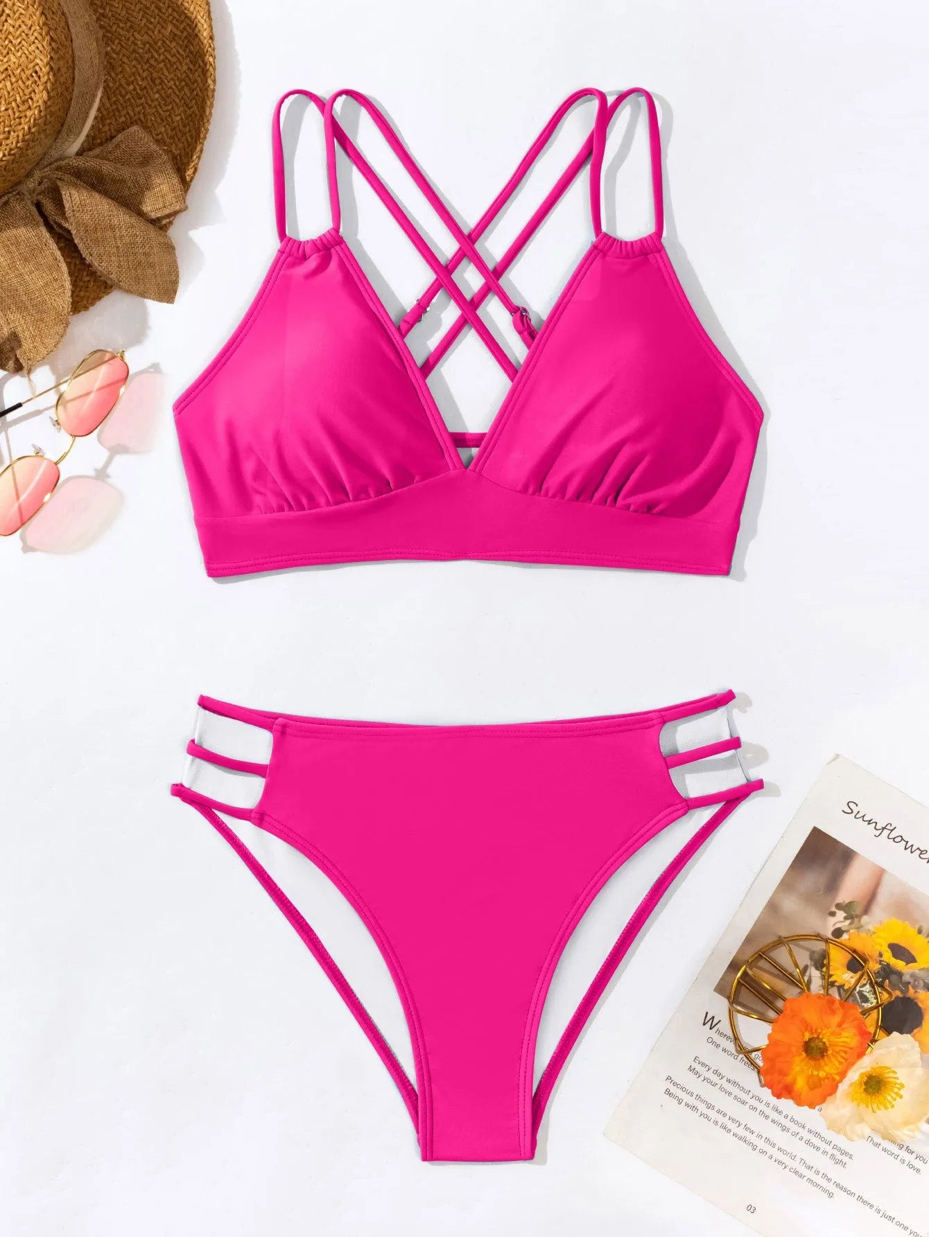 Women's black halter V-neck bikini top and matching split-style swim shorts.