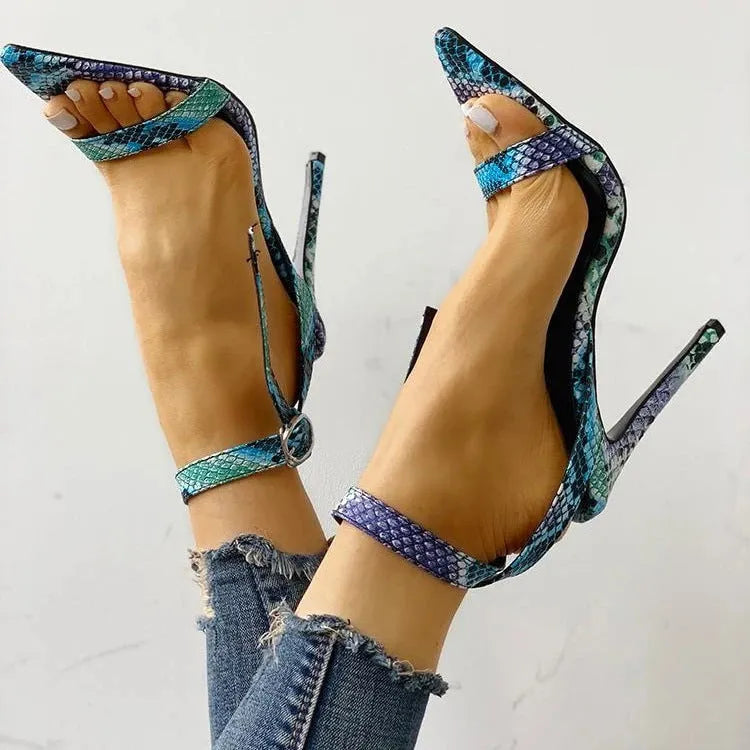 Blue serpentine high heels with a toe buckle and hollow-out design on the artificial PU upper.