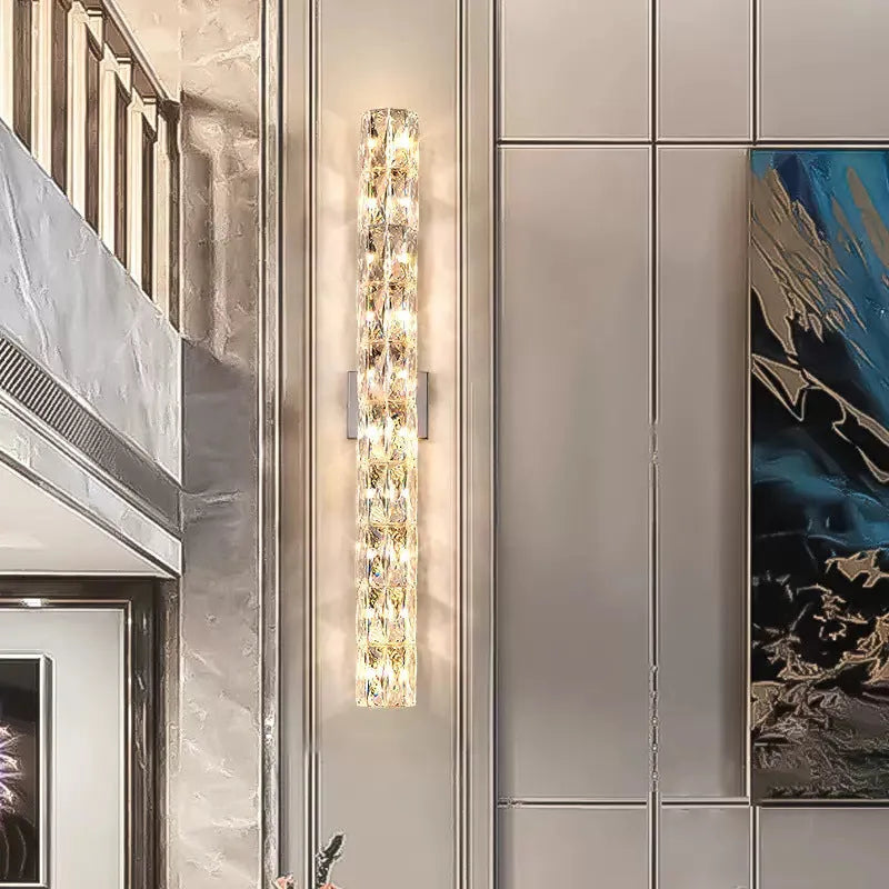 Crystal wall lamp with stainless steel base in chrome finish, LED light source