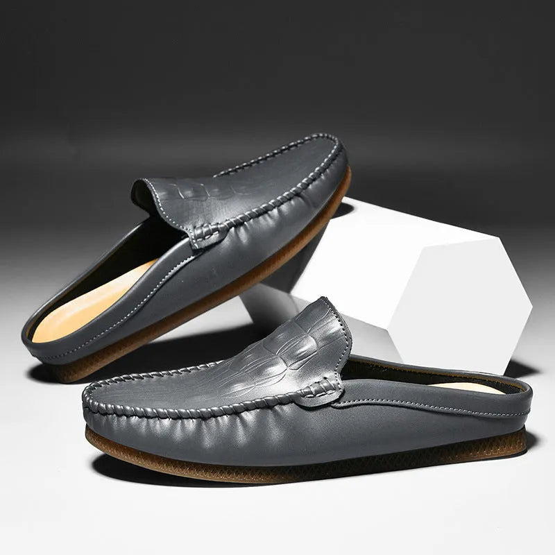 Men's black breathable semi-slippers with a rubber sole and artificial PU upper on a plain background.