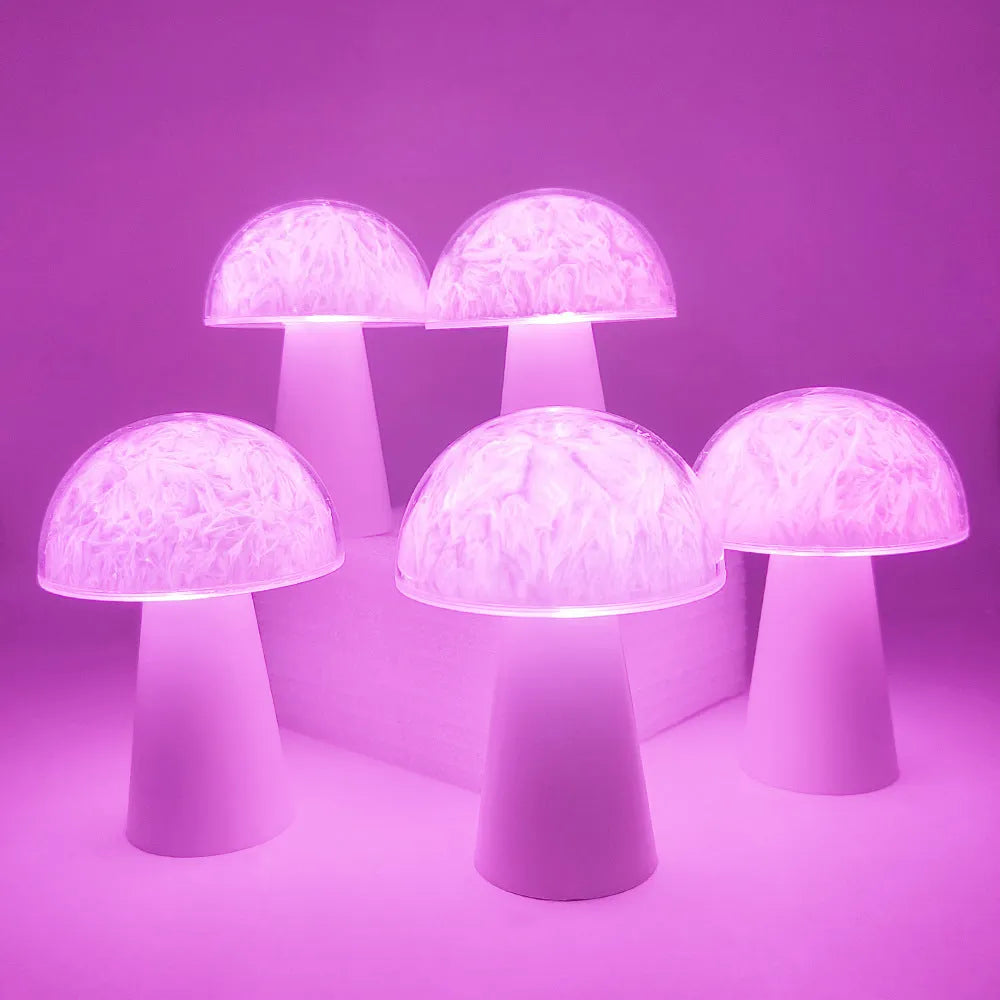 Mushroom-shaped RGB colour changing ambience lamp with remote control on wooden surface