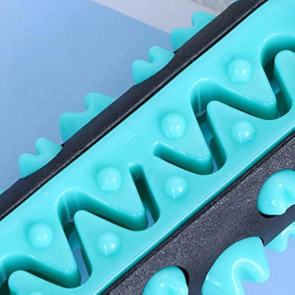 Natural rubber dog toothbrush chew toy in blue colour, showing textured surface for cleaning teeth.