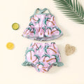 White two-piece toddler swimsuit set with shirt and shorts for beachwear
