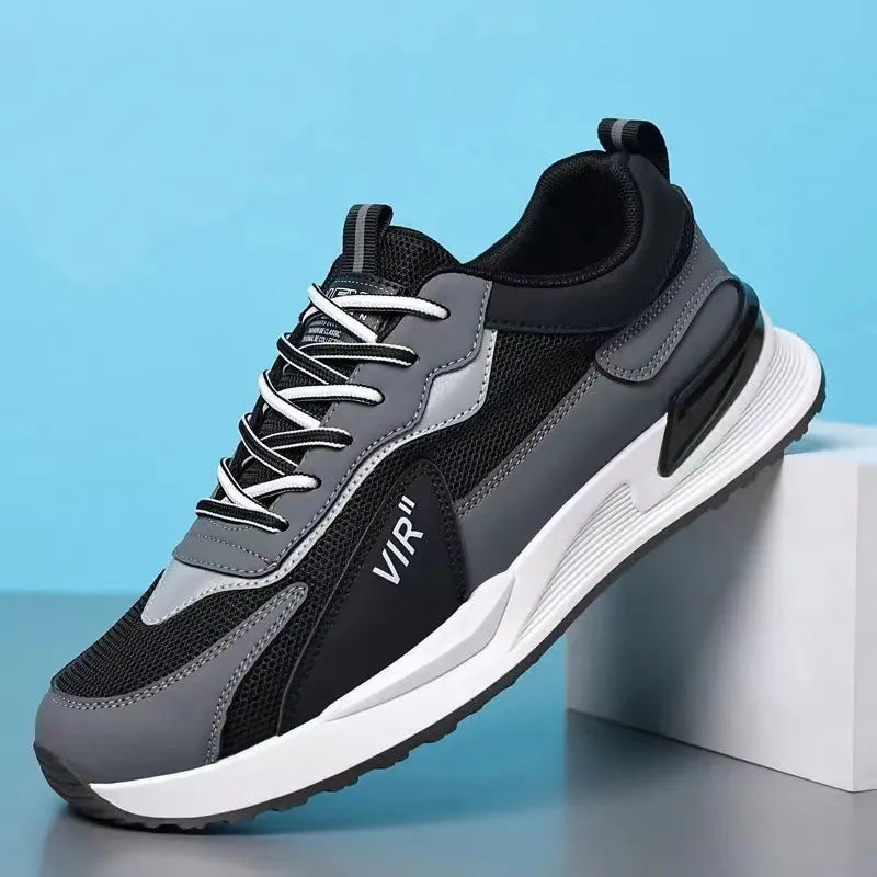 Men's colour block mesh sneakers in black, grey, and white with a lace-up design.