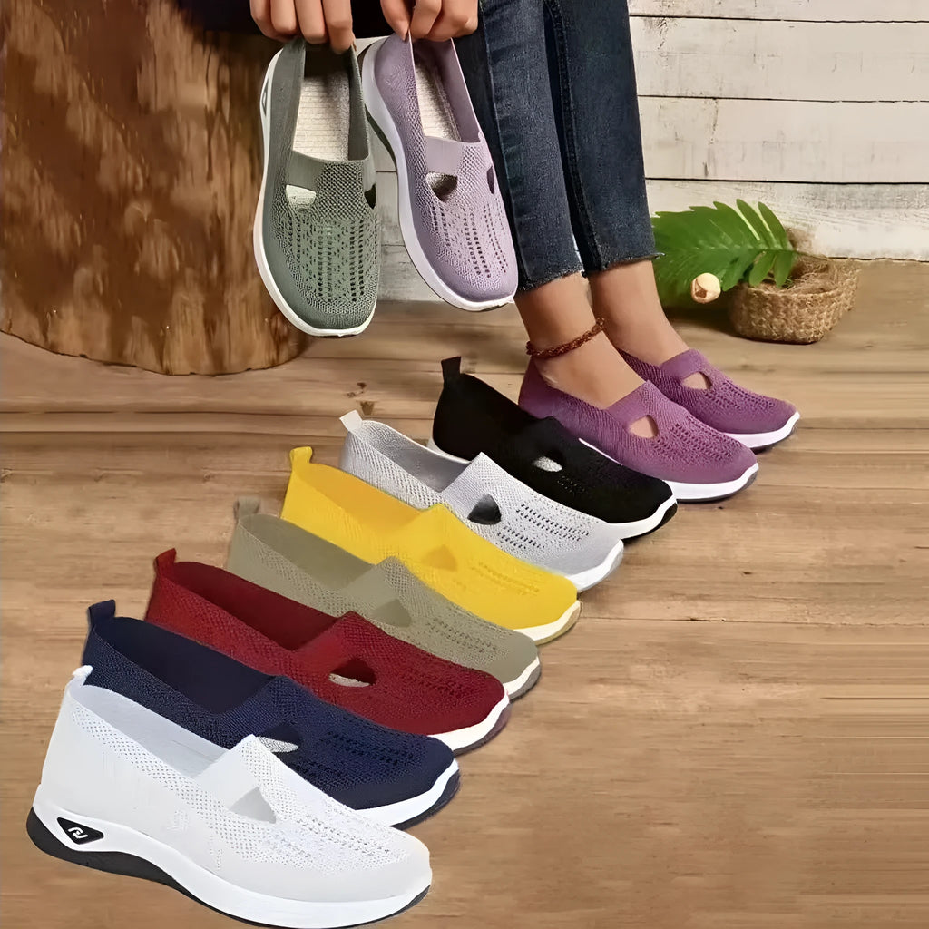 Women's solid colour mesh T-strap casual shoes with flat heel and round toe.